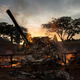 Sunset over a pile of burning elephant tusks, Cameroon. Image: Andrew Harnik/AP